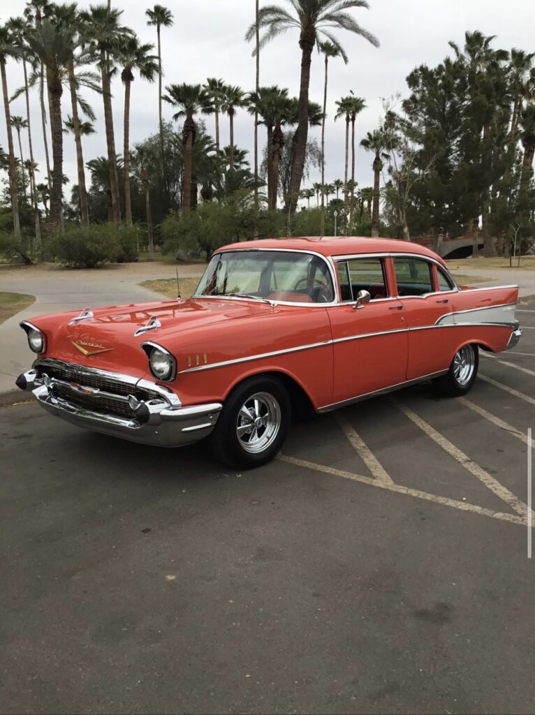Fully restored 1957 Chevrolet Bel Air refinished in red and white by Manny's Paint and Body Shop in Phoenix
